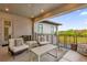 Relaxing balcony with outdoor furniture and a pool view at 1038 Jack Nicklaus Ct, Kissimmee, FL 34747