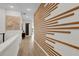 Light and airy hallway with wood-paneled wall at 1038 Jack Nicklaus Ct, Kissimmee, FL 34747