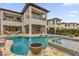 Resort-style pool and spa with fire pit at 1038 Jack Nicklaus Ct, Kissimmee, FL 34747