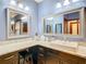 Bathroom with corner vanity, granite countertop, and ample lighting at 1105 Superior Ct, Winter Springs, FL 32708