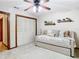 Bright bedroom featuring a daybed, closet, and shelving at 1105 Superior Ct, Winter Springs, FL 32708