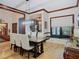 Formal dining room with a large wooden table and chandelier at 1105 Superior Ct, Winter Springs, FL 32708