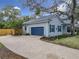 Attached two-car garage with driveway at 1105 Superior Ct, Winter Springs, FL 32708