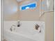 Relaxing bathroom with soaking tub and large window at 13805 Bressler Aly, Windermere, FL 34786