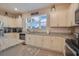 Modern kitchen with white cabinets, granite counters at 13805 Bressler Aly, Windermere, FL 34786