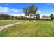 Community park with grassy areas and benches at 13805 Bressler Aly, Windermere, FL 34786