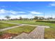 Brick sidewalks wind through grassy areas in the community at 13805 Bressler Aly, Windermere, FL 34786