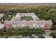 Aerial view of a large apartment complex with ample parking at 1410 Celebration Ave # 101, Celebration, FL 34747