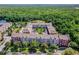 Aerial view of apartment complex near a wooded area at 1410 Celebration Ave # 101, Celebration, FL 34747