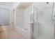 Bathroom with soaking tub, shower, and tile flooring at 1410 Celebration Ave # 101, Celebration, FL 34747