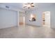 Open living room with views into kitchen area at 1410 Celebration Ave # 101, Celebration, FL 34747