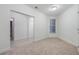 Empty office with neutral walls and carpeted floor at 1410 Celebration Ave # 101, Celebration, FL 34747