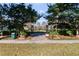 Landscaped community park with paved pathway at 1410 Celebration Ave # 101, Celebration, FL 34747