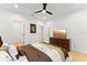 Large bedroom with a king-size bed and TV at 14255 Spring Garden Dr, Winter Garden, FL 34787