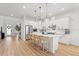 Modern white kitchen with stainless steel appliances at 14255 Spring Garden Dr, Winter Garden, FL 34787