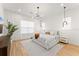 Main bedroom with king-size bed and a large window at 14255 Spring Garden Dr, Winter Garden, FL 34787