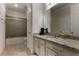 Bathroom with granite countertop, tub, and shower at 16669 Varone Cove Ct, Winter Garden, FL 34787