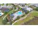 Resort-style community pool with expansive sundeck and palm trees at 16669 Varone Cove Ct, Winter Garden, FL 34787