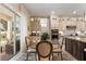 Bright and airy kitchen nook with access to the backyard at 16669 Varone Cove Ct, Winter Garden, FL 34787