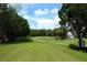 Scenic view of the community golf course at 214 Covent Garden Ave, Davenport, FL 33897