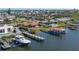 Boat, dock and waterfront home, aerial view at 218 S Venetian Way, Port Orange, FL 32127