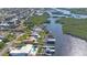 Wide aerial view of waterfront homes, showcasing neighborhood and canal access at 218 S Venetian Way, Port Orange, FL 32127