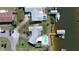 Bird's-eye view of home, pool, and private dock at 218 S Venetian Way, Port Orange, FL 32127