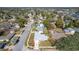Overhead shot of a residential neighborhood showing a home with mature landscaping and convenient street access at 2207 Winter Woods Blvd, Winter Park, FL 32792