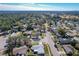 Wide aerial view of the neighborhood, highlighting the property's surroundings at 2207 Winter Woods Blvd, Winter Park, FL 32792