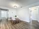 Charming dining room featuring a round table, modern chairs, and fresh white paint at 2207 Winter Woods Blvd, Winter Park, FL 32792