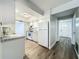 White kitchen with granite countertops and stainless steel appliances at 2207 Winter Woods Blvd, Winter Park, FL 32792