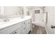 Bathroom with double vanity, shower, and updated fixtures at 2501 Jennifer Hope Blvd, Longwood, FL 32779