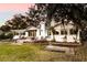 White house with landscaping, showcasing curb appeal at 2501 Jennifer Hope Blvd, Longwood, FL 32779