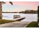 Private dock extending into the lake, ideal for fishing or boating at 2501 Jennifer Hope Blvd, Longwood, FL 32779