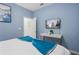 Bright bedroom with a queen bed and a TV at 2628 Calistoga Ave, Kissimmee, FL 34741