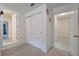 Hallway with access to other rooms and closets at 2711 Angel Mist Ct, Mascotte, FL 34753