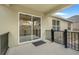 Covered patio with sliding glass doors at 2711 Angel Mist Ct, Mascotte, FL 34753