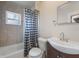 Clean bathroom with shower/tub, vanity, and checkered curtain at 2914 Sprague Dr, Orlando, FL 32826