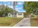 House exterior showcasing a carport and well-maintained lawn at 2914 Sprague Dr, Orlando, FL 32826