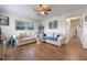 Bright living room featuring hardwood floors and comfy seating at 2914 Sprague Dr, Orlando, FL 32826