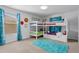 Toy Story themed bedroom with a built-in bunk bed at 2957 Beach Palm Ave, Kissimmee, FL 34747