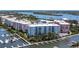 Aerial view of waterfront community with condos and boat docks at 3 Riverwalk Dr # 405, New Smyrna Beach, FL 32169