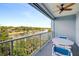 Relaxing balcony overlooking a scenic waterway with waterfront views at 3 Riverwalk Dr # 405, New Smyrna Beach, FL 32169