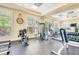 Fitness center with various weight machines and a large mirror at 3 Riverwalk Dr # 405, New Smyrna Beach, FL 32169