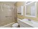 Clean bathroom, shower/tub combo, vanity, and mirror at 30845 Westward Ho Ave, Sorrento, FL 32776