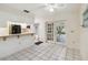 Dining area with French doors leading to backyard at 30845 Westward Ho Ave, Sorrento, FL 32776