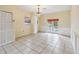 Bright dining room with chandelier and French doors at 30845 Westward Ho Ave, Sorrento, FL 32776