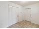 Bright entryway with tiled floor and two doors at 30845 Westward Ho Ave, Sorrento, FL 32776