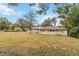 Ranch house with large yard and mature trees at 30845 Westward Ho Ave, Sorrento, FL 32776