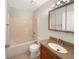 Clean bathroom with tub, toilet and vanity at 311 Silver Pine Dr, Lake Mary, FL 32746